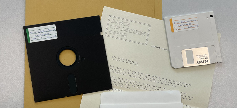 A 5.25-inch floppy disk and a 3.5-inch floppy disk, with accompanying letter.