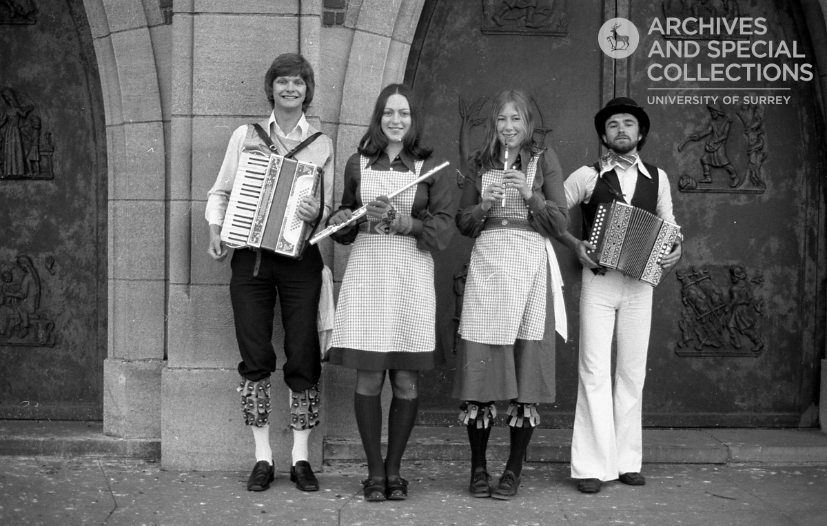 Photograph of morris dancers with musical instruments