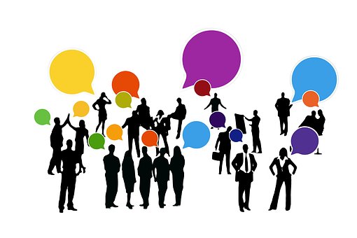 Cartoon of groups of people networking with coloured speech bubbles