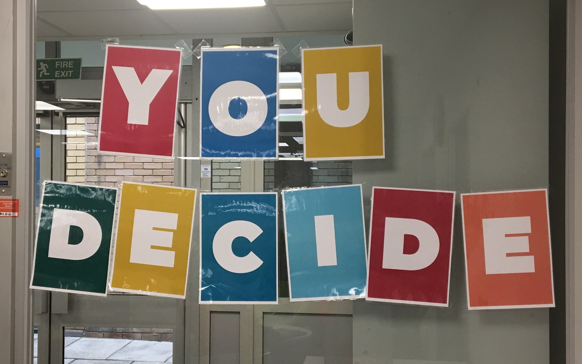 Colourful sign of You Decide