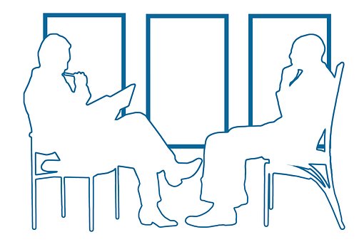 line drawing of 2 seated people facing each other