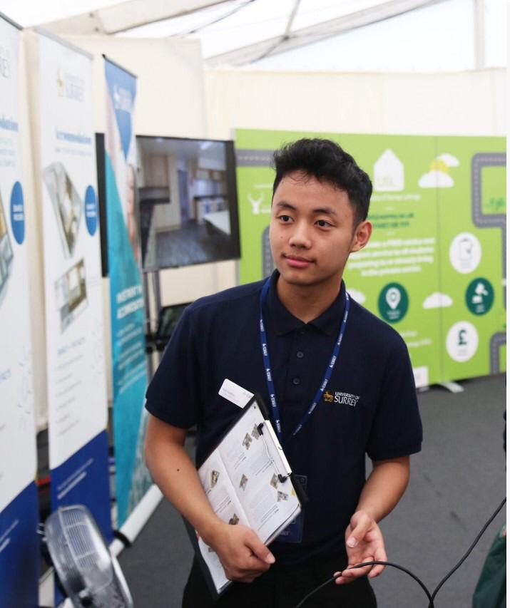 Image of a student helping out on a Open Day