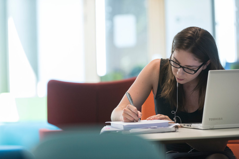 Student studying in the quiet area of the library