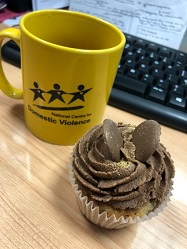 Aimee's National Centre for Domestic Violence mug and cupcake, from her placement year with the NCDV