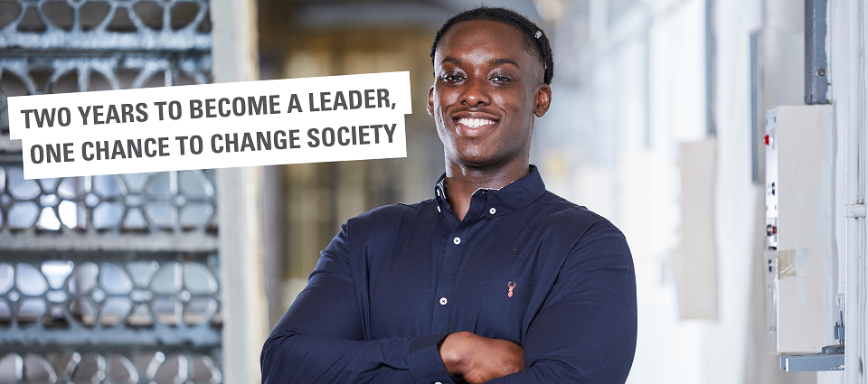 An image of a young man smiling.