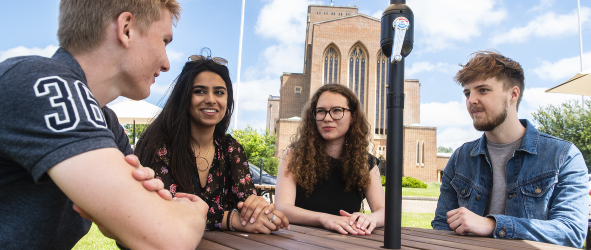 Group of postgraduate students outside the cathedral