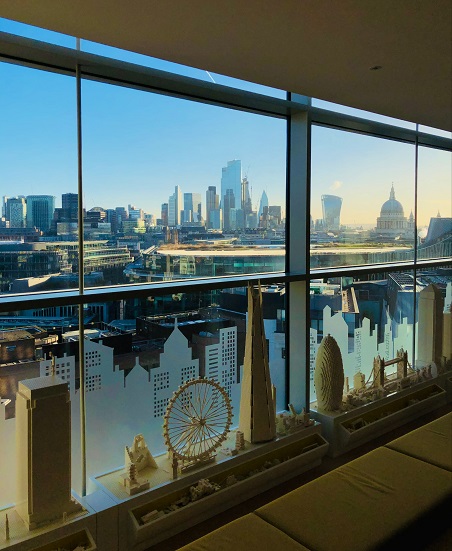 The London skyline through a window on a sunny day