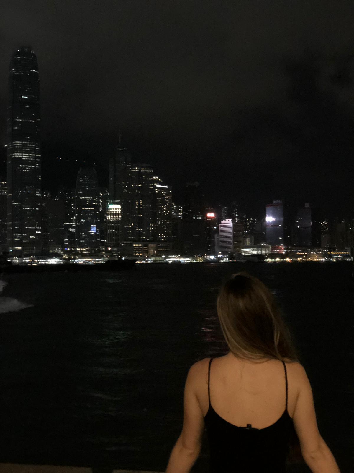 Me enjoying the view of Hong Kong skyline from the Victoria Harbour 