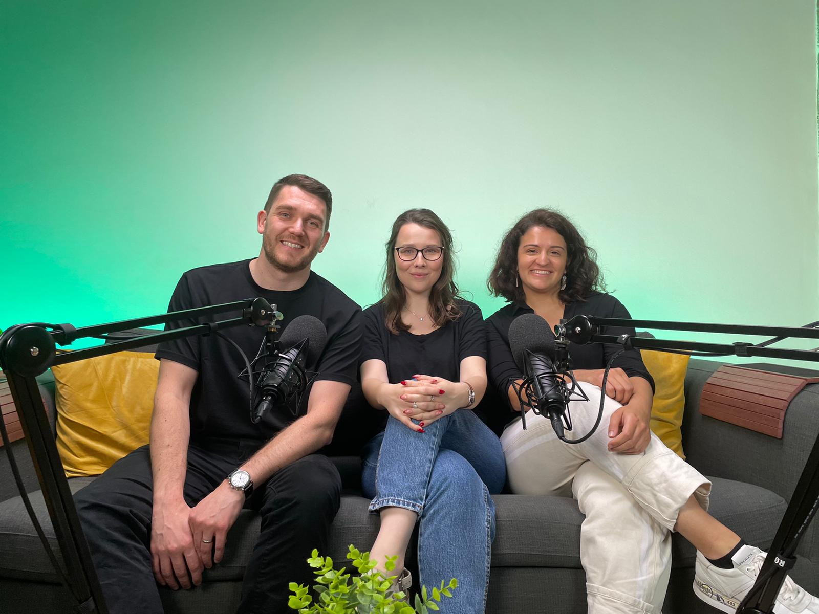 Alessia and two of her colleagues from placement recording a podcast episode in a studio.