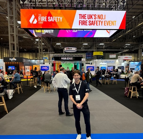 Louis standing in front of the stage at the NEC