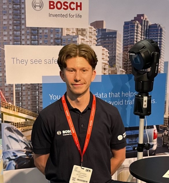 Louis standing in front of a Bosch backdrop