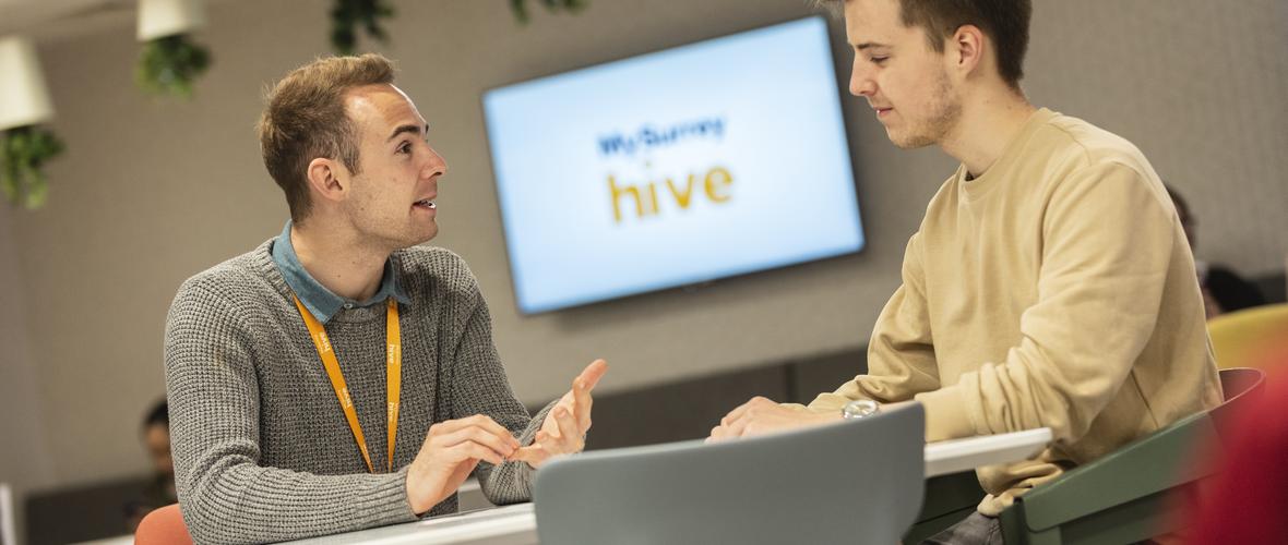 MySurrey Hive team member discusses a query with a student. 