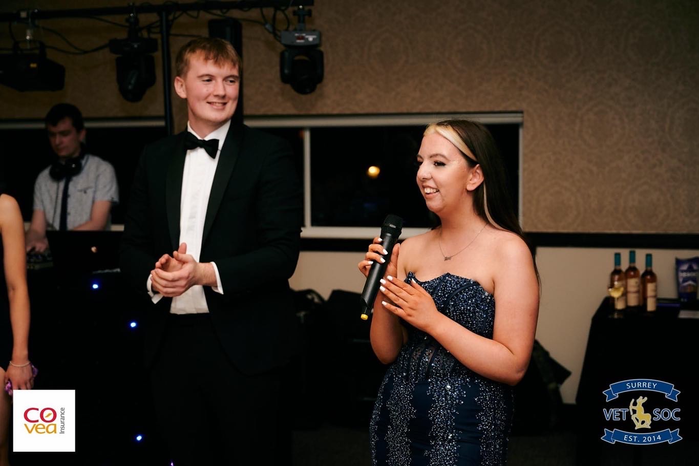 Vet students in formal dress giving a speech at University of Surrey Vetsoc Ball