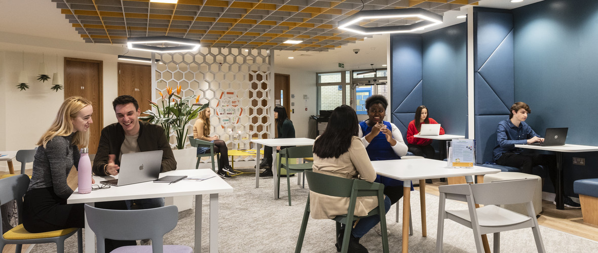 Students sitting and studying in the MySurrey Hive